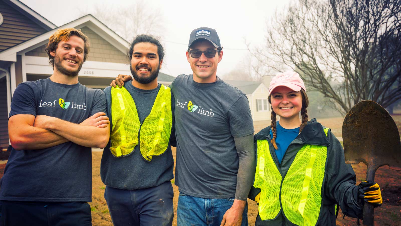 People collaborating outdoors, representing shared purpose and values.