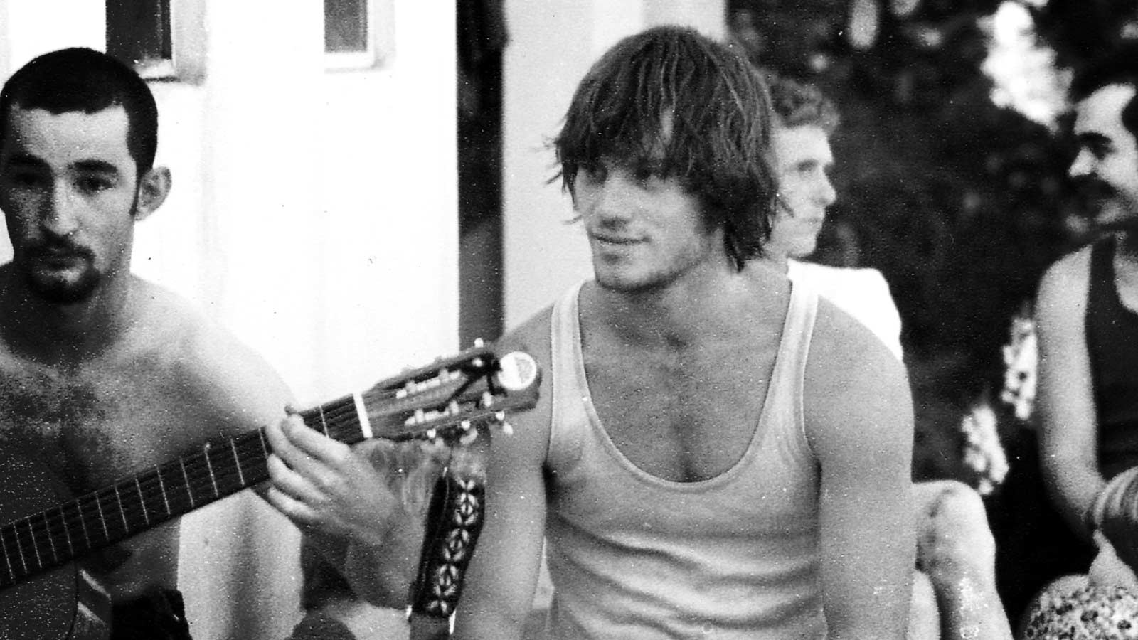 Young Colin Camu listening to music